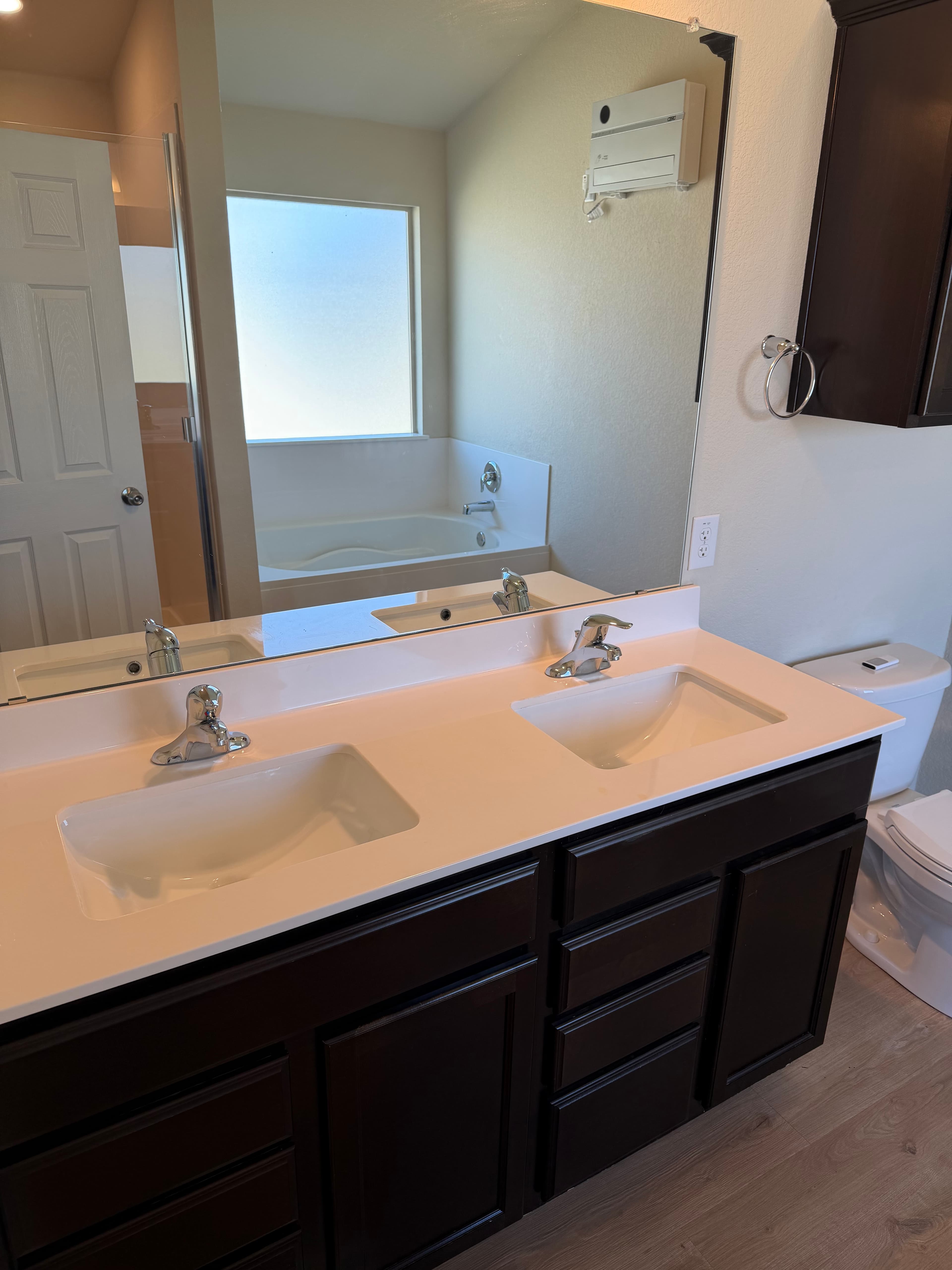 Clean bathroom counter with mirror