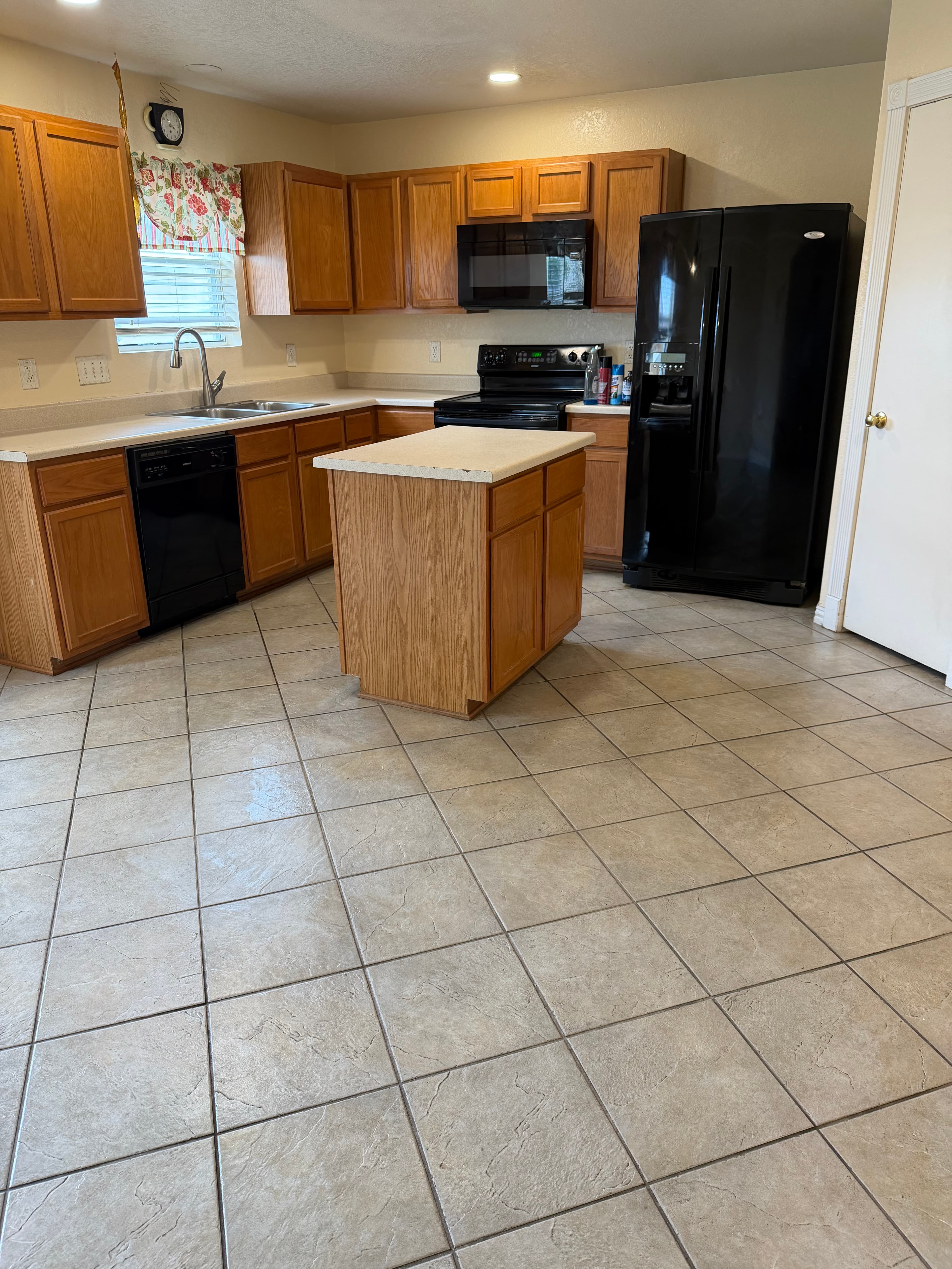 Clean kitchen with cabinets